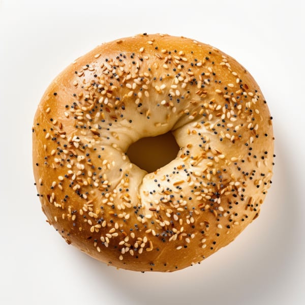 Top-down view of a single Atlantic Bagel Co. everything bagel with sesame and poppy seeds.